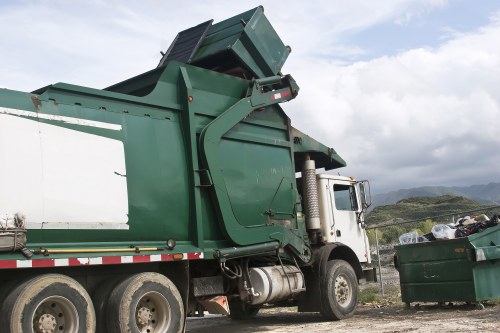 Professional waste clearance team managing construction debris